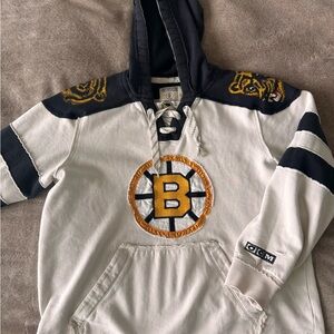 CCM Black and White Hockey Hoodie with Gold Details